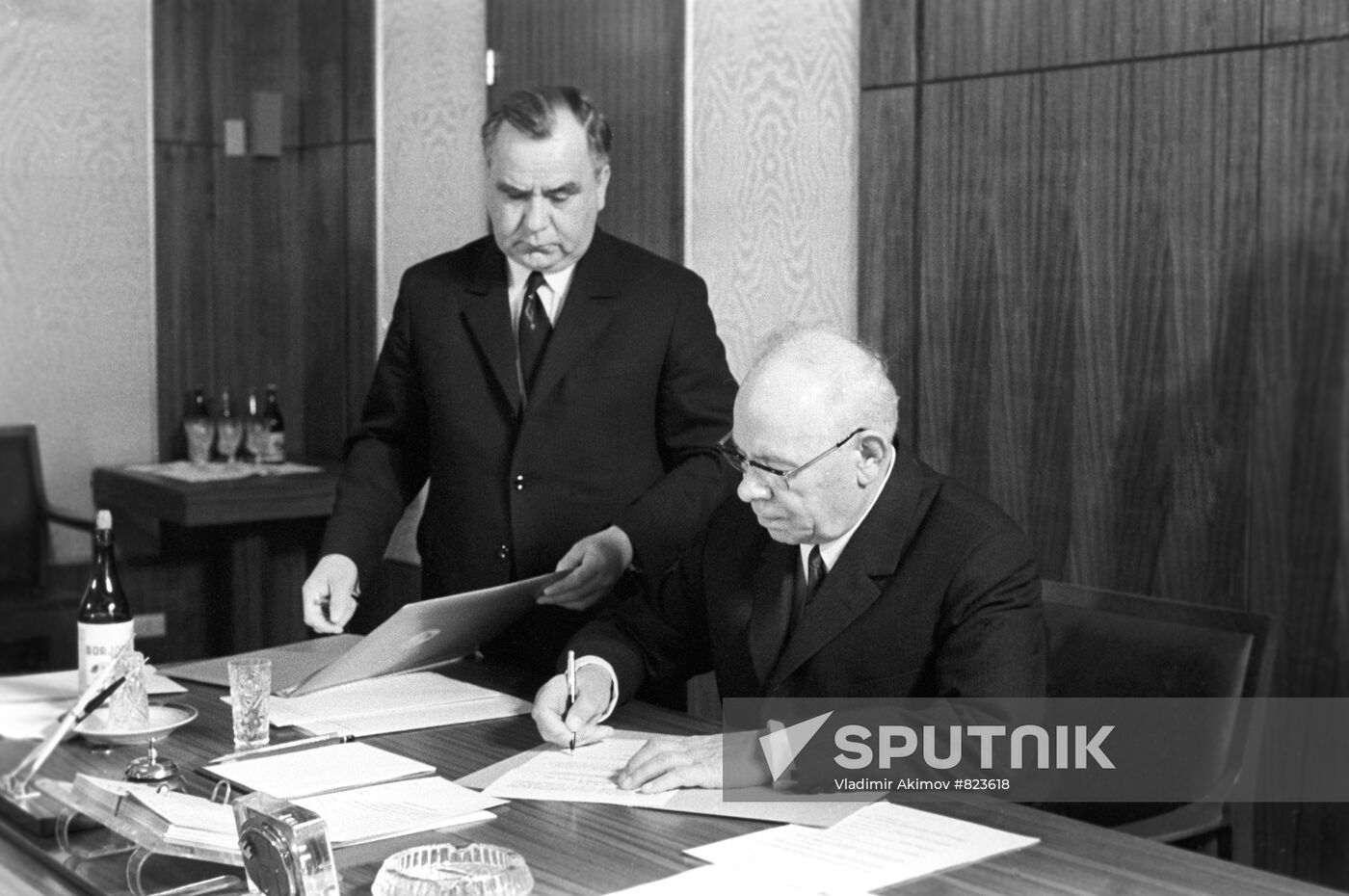 Nikolai Viktorovich Podgorny signing documents