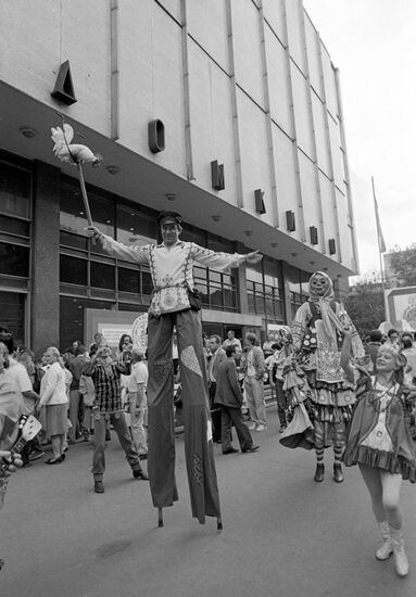Skomorokhs perform in front of Central Cinema House