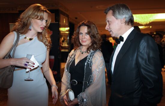 Olga Rodionova and Alexei Pushkov with his wife, Nina
