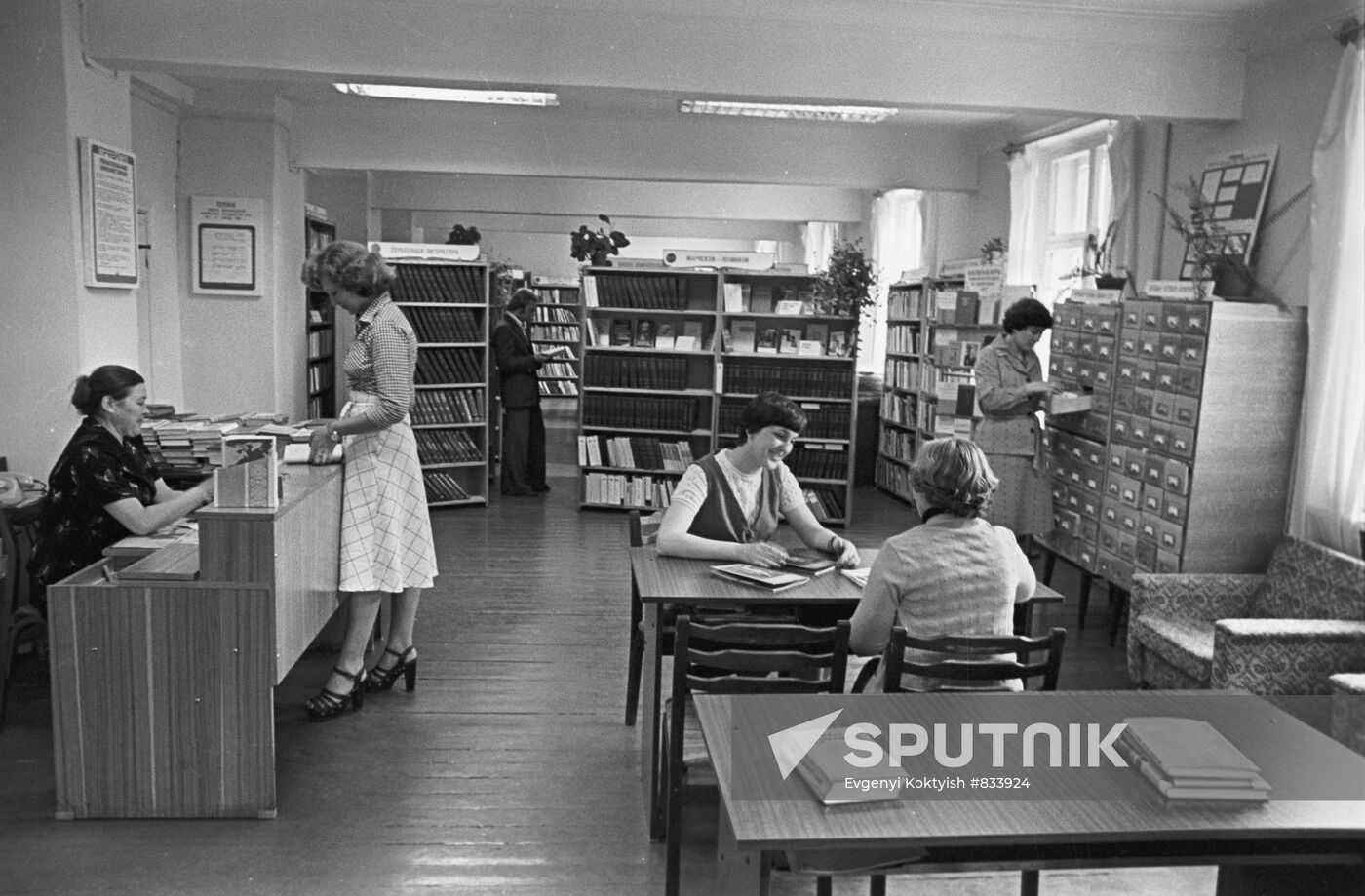 Workers at a plant library