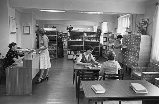 Workers at a plant library