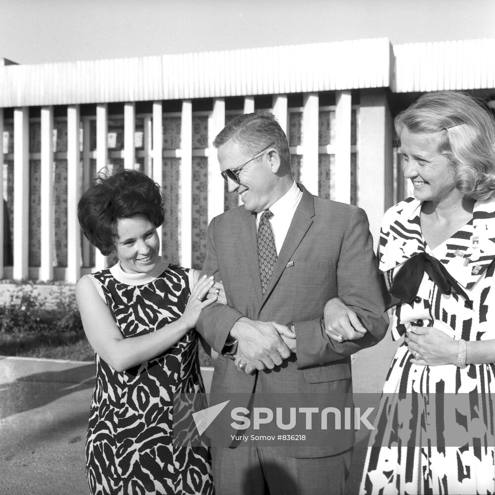 Frank Borman with his wife Susan and Tamara Titova