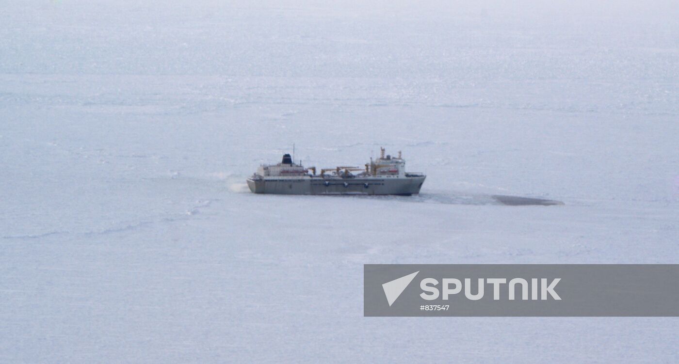 Icebreakers leading out ice-trapped ships in Sea of Okhotsk