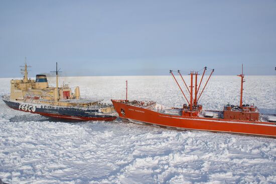 Icebreakers leading out ice-trapped ships in Sea of Okhotsk