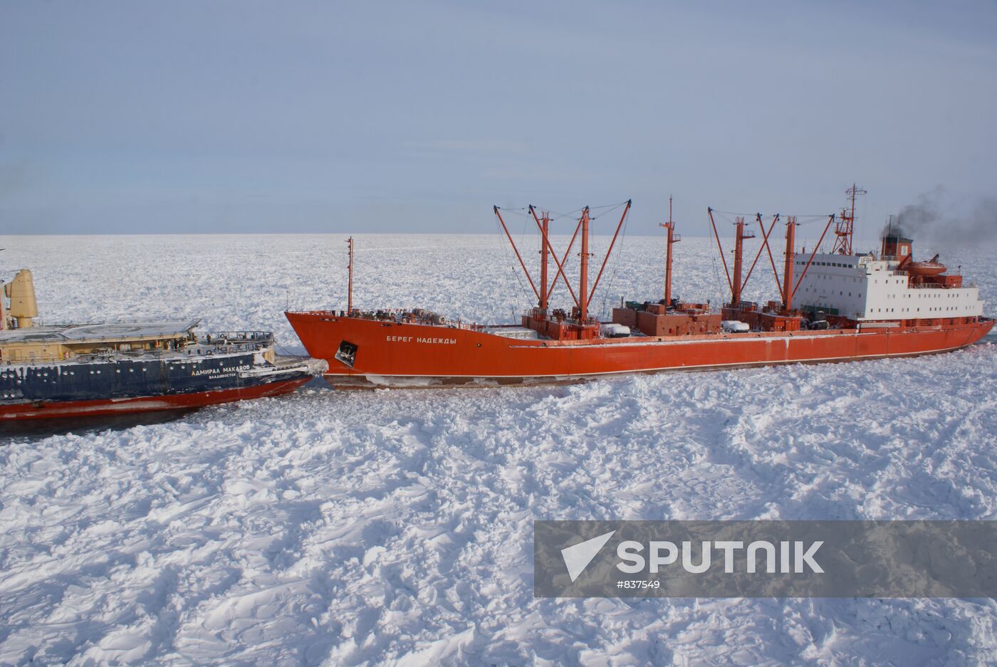 Icebreakers leading out ice-trapped ships in Sea of Okhotsk