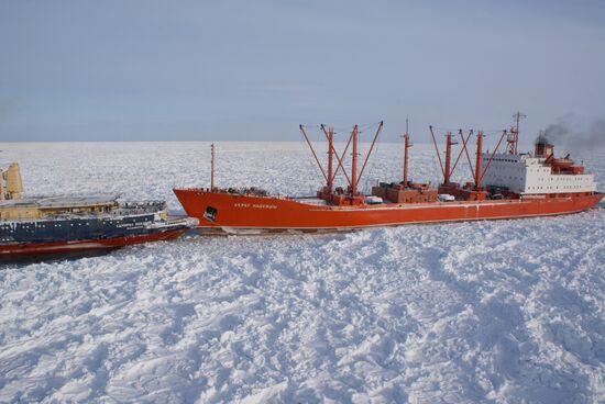 Icebreakers leading out ice-trapped ships in Sea of Okhotsk