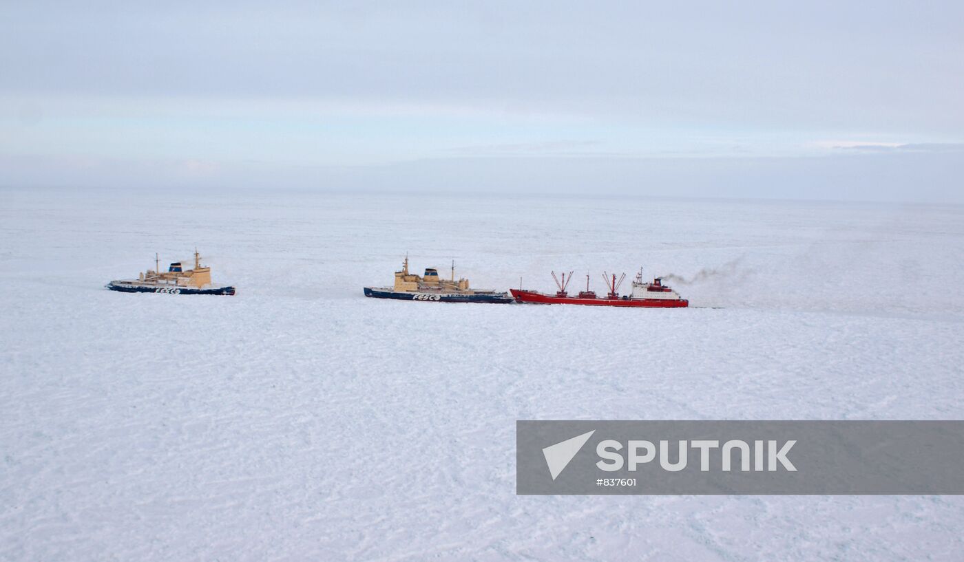 Icebreakers leading out ice-trapped ships in Sea of Okhotsk