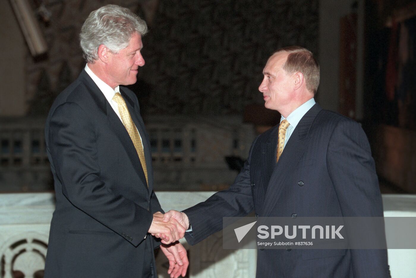 Vladimir Putin and Bill Clinton