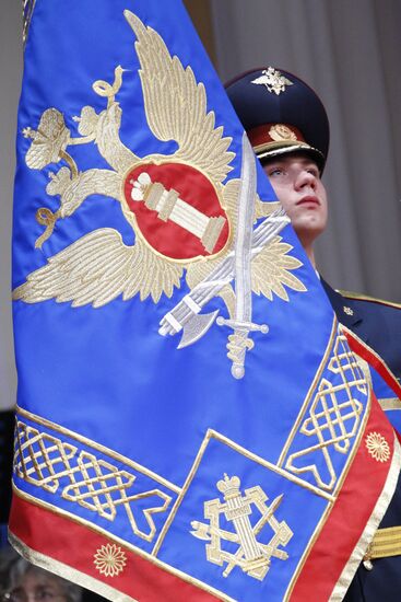 Ceremony of nailing down FPS flag to pole