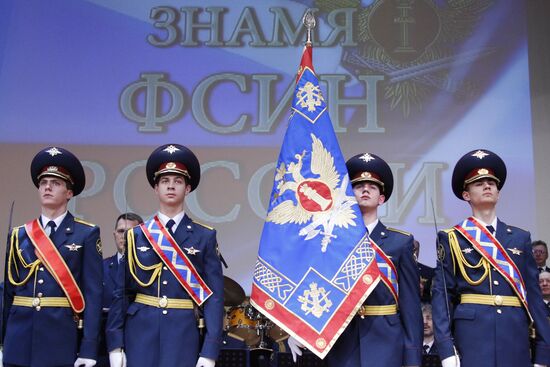 Ceremony of nailing down FPS flag to pole