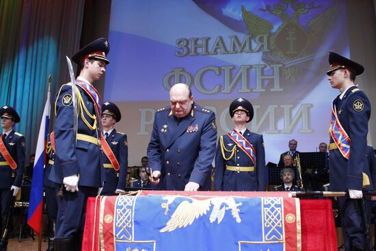 Ceremony of nailing down FPS flag to pole