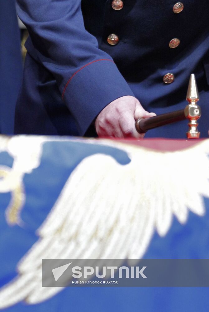 Ceremony of nailing down FPS flag to pole