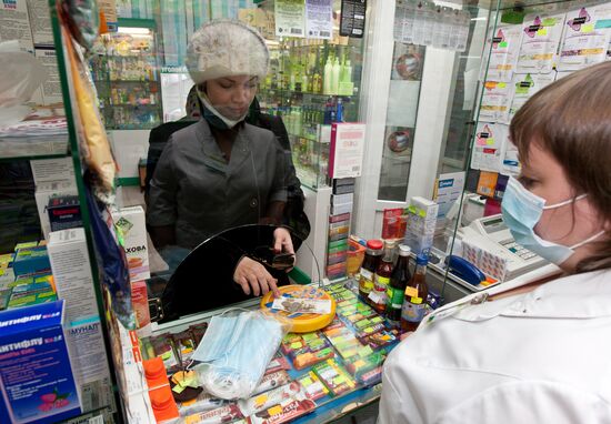 Flu protective masks and medications sold at Tomsk drugstores
