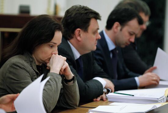 Elvira Nabiullina, Konstantin Chuichenko and Arkady Dvorkovich