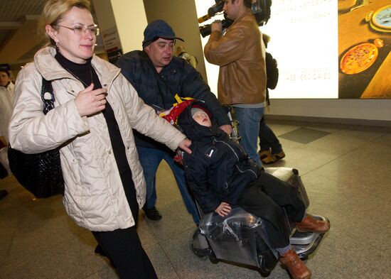 Russian tourists from riots-hit Tunisia arrive in Moscow