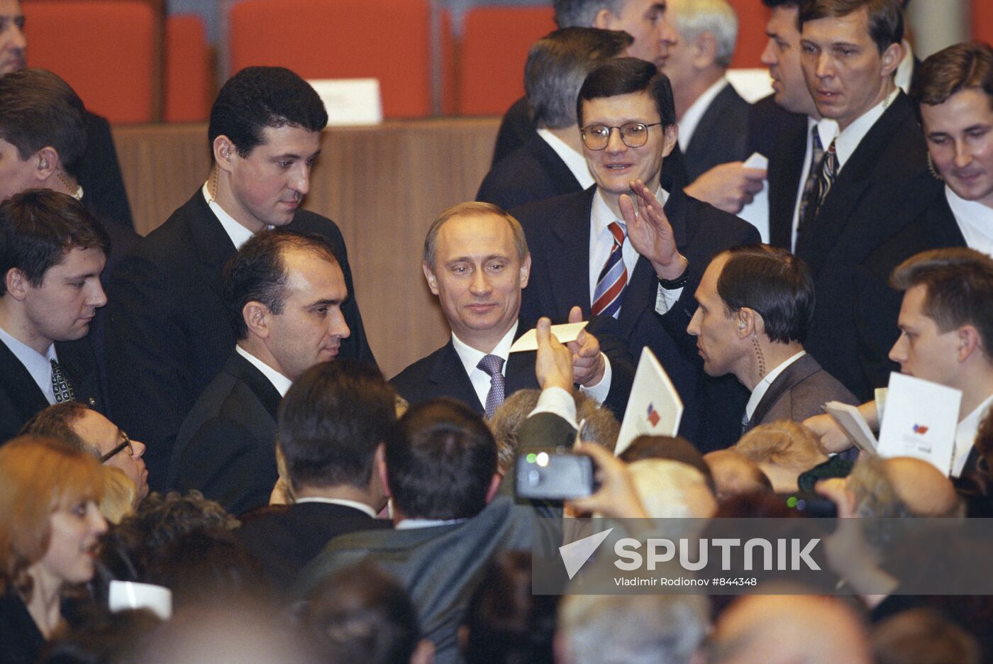 Vladimir Putin speaks with meeting participants