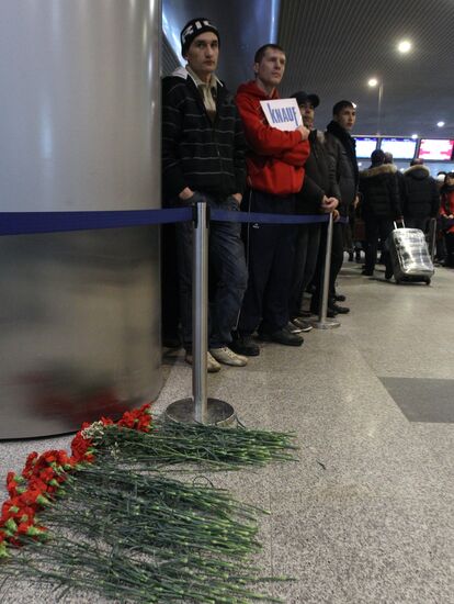 Flowers on the floor at the Domodedovo arrival's hall