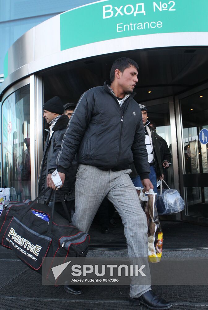 Passengers leaving Domodedovo airport building