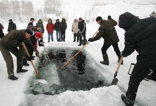 Ice hole being made in "Saucer" lake