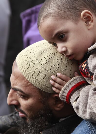 Cairo resident with his child