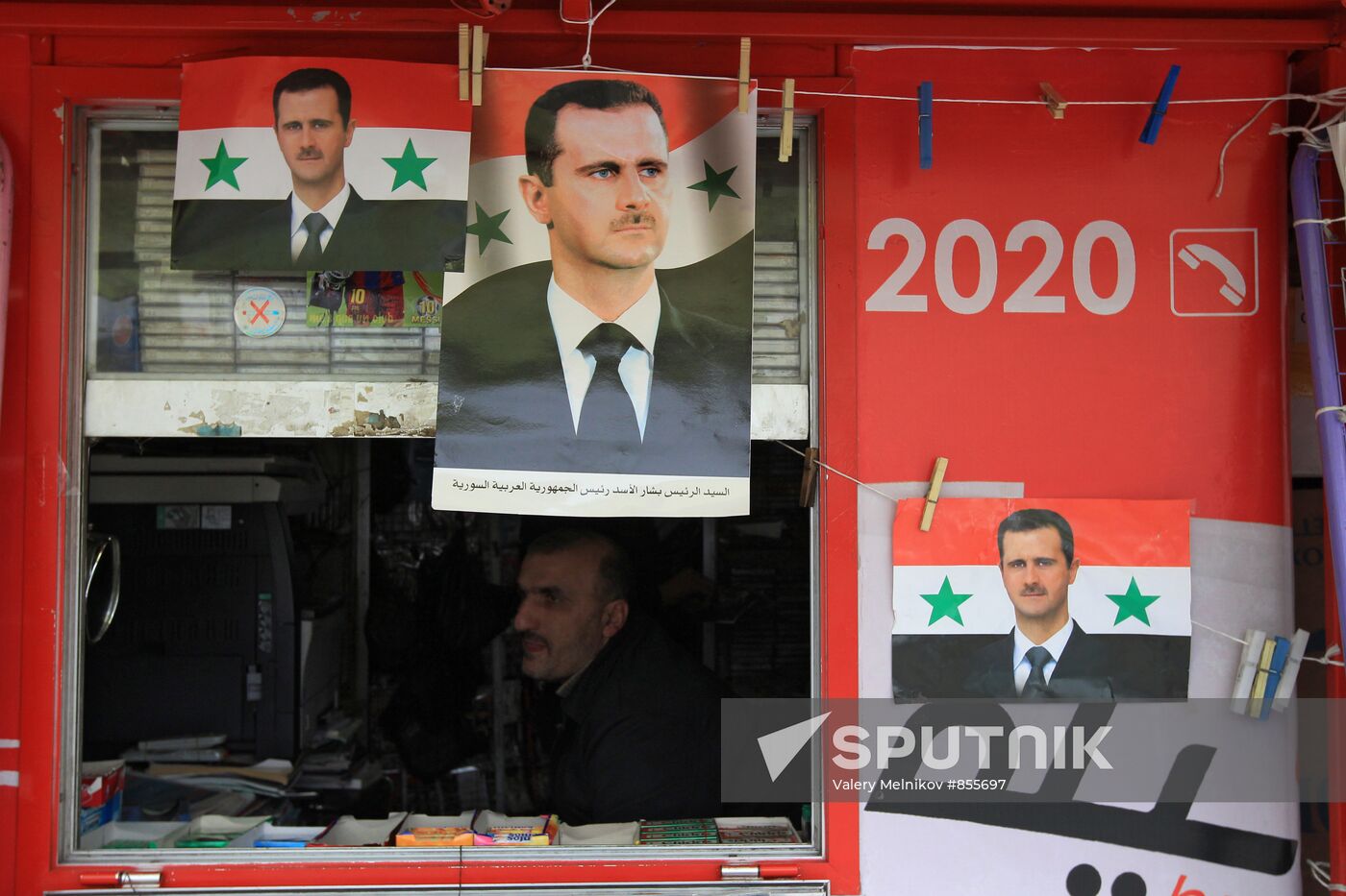 Salesman at newsagents in Damascus