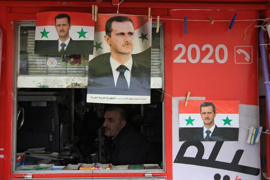 Salesman at newsagents in Damascus
