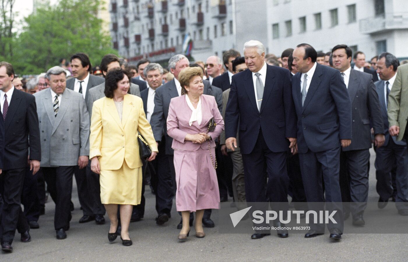 B. Yeltsin and N. Yeltsin walking the city streets