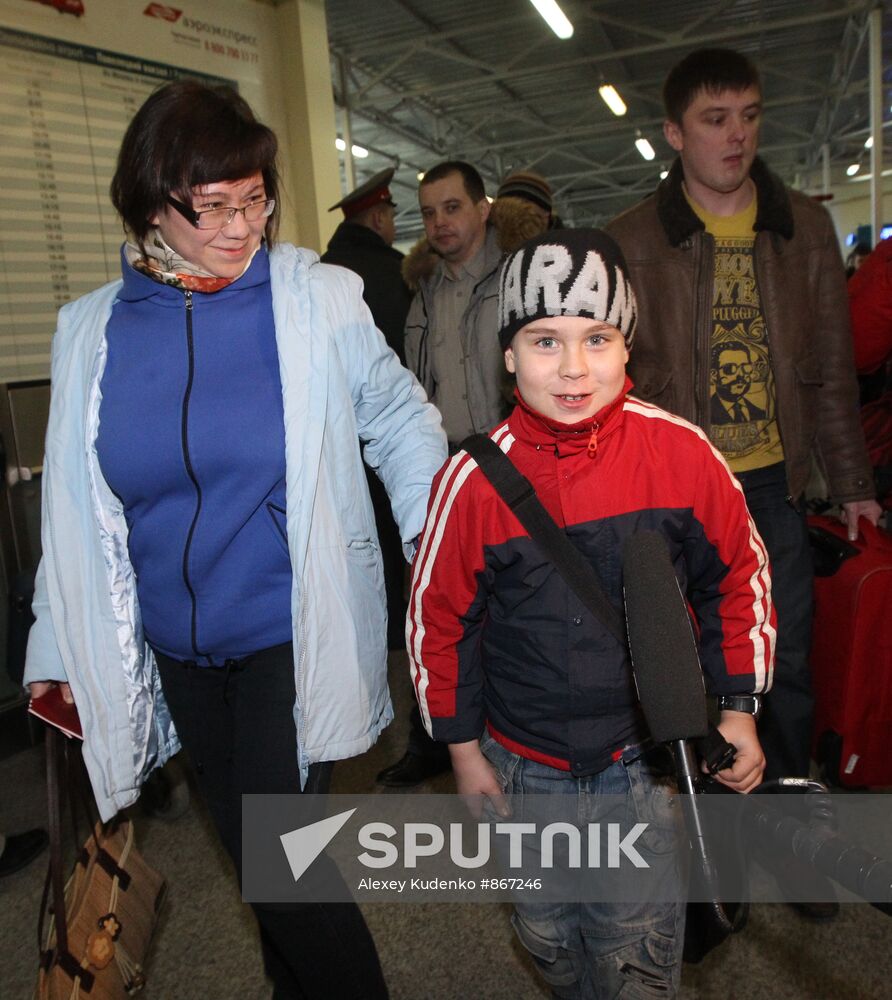 Russians evacuated from Libya being met in Domodedovo