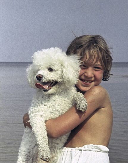 A child with a dog