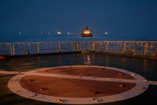 Vaigach nuclear icebreaker leading ships through Gulf of Finland