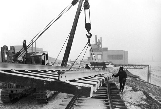 Laying railroad tracks