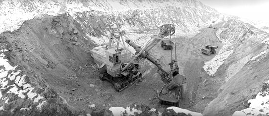 Excavators in quarry