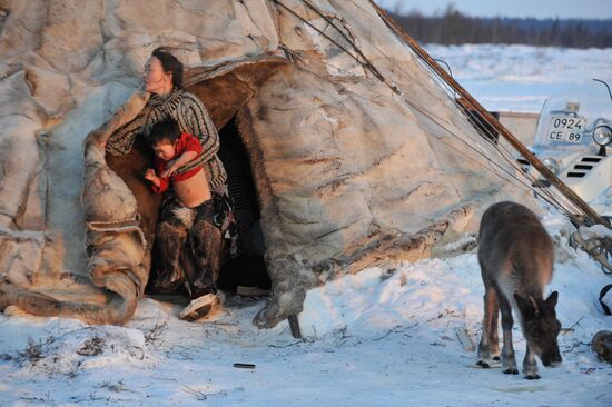 Nenets woman with a child