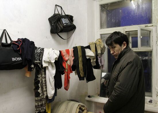 Federal Migration Service officers check up empty house