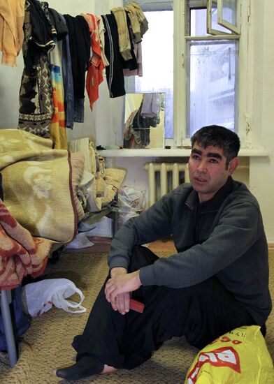 Federal Migration Service officers check up empty house