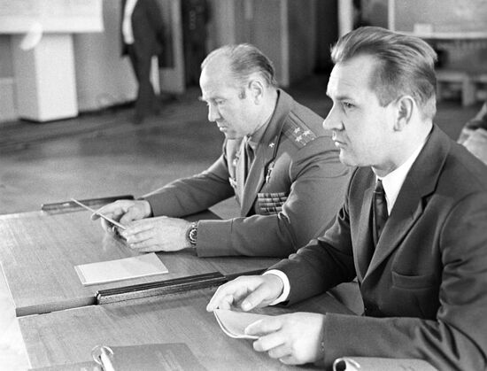 Cosmanauts Valery Kubasov and Alexei Leonov in classroom