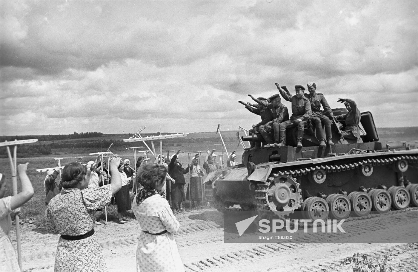 Soviet tank operators on captured tank