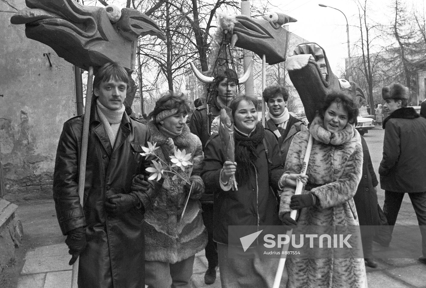 Young people going to attend a traditional spring-time fair