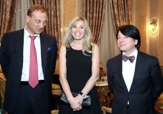 Leonid Kazinets, Valentin Yudashkin with his wife Marina