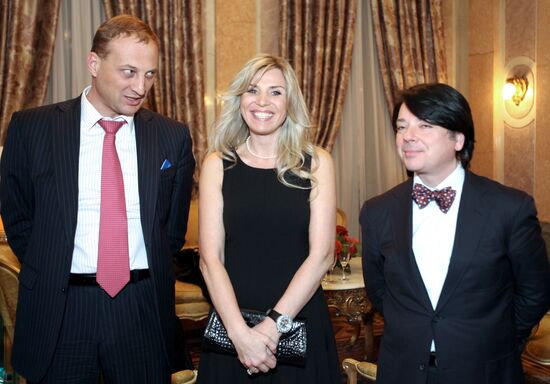 Leonid Kazinets, Valentin Yudashkin with his wife Marina