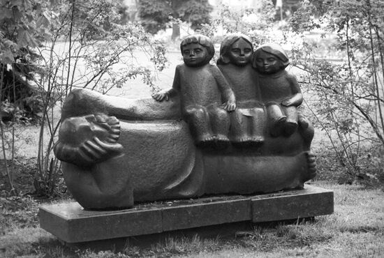 Sculpture "Old Man with His Grandchildren"