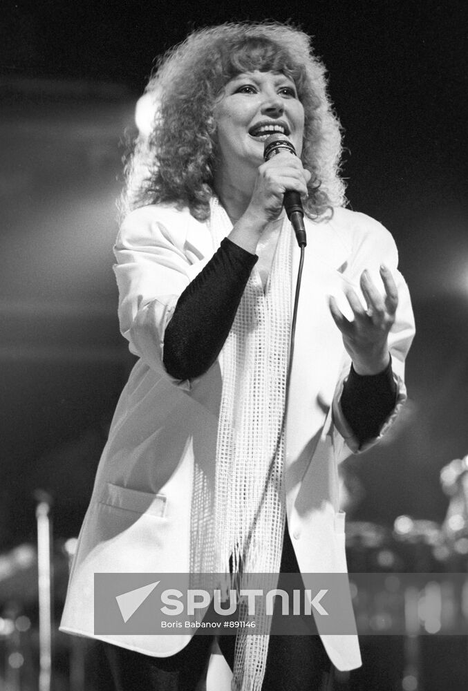 Alla Pugachyova performs on stage
