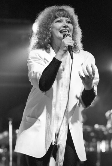 Alla Pugachyova performs on stage