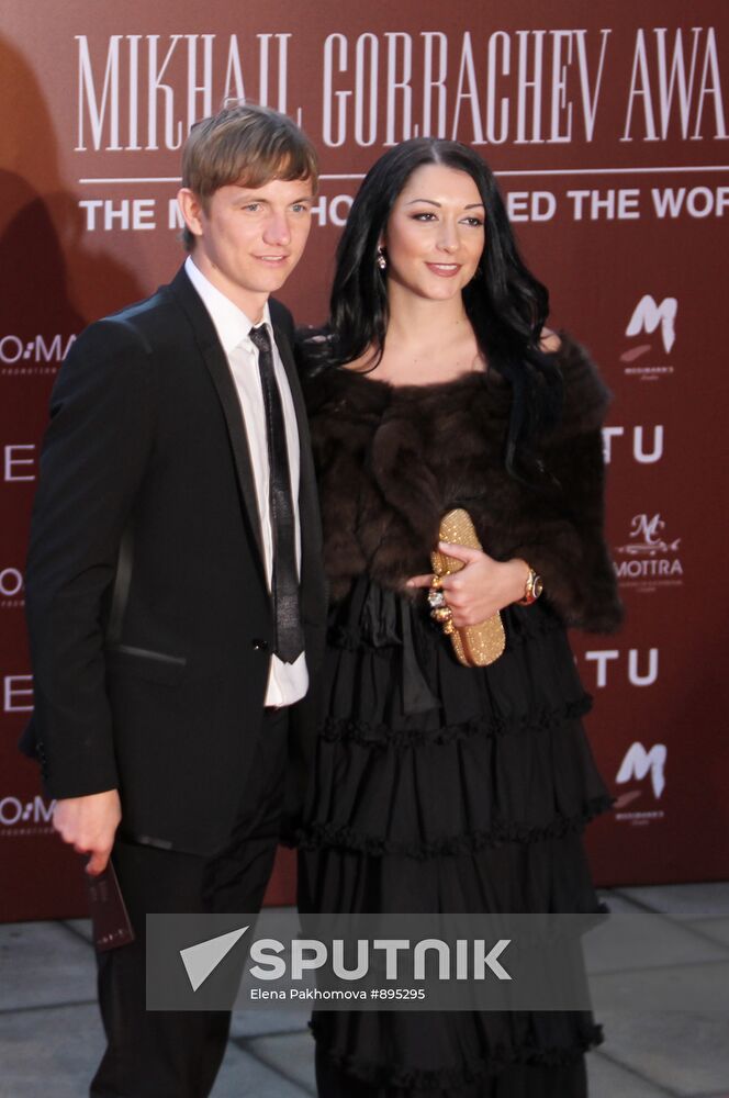 Roman Pavlyuchenko with his wife, Larisa