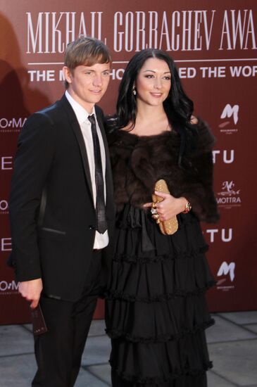 Roman Pavlyuchenko with his wife, Larisa