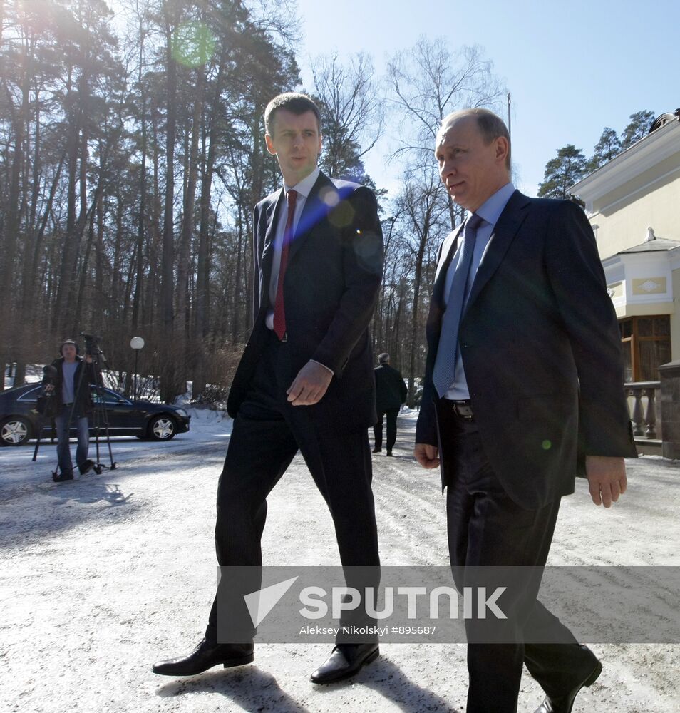 Prime Minister Vladimir Putin drives new Yo-Mobile car