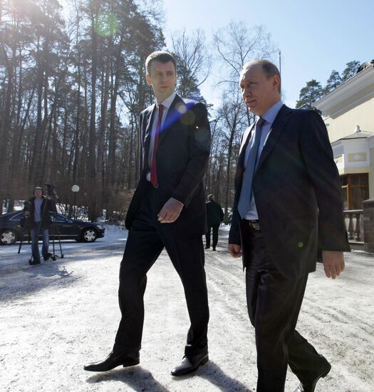 Prime Minister Vladimir Putin drives new Yo-Mobile car