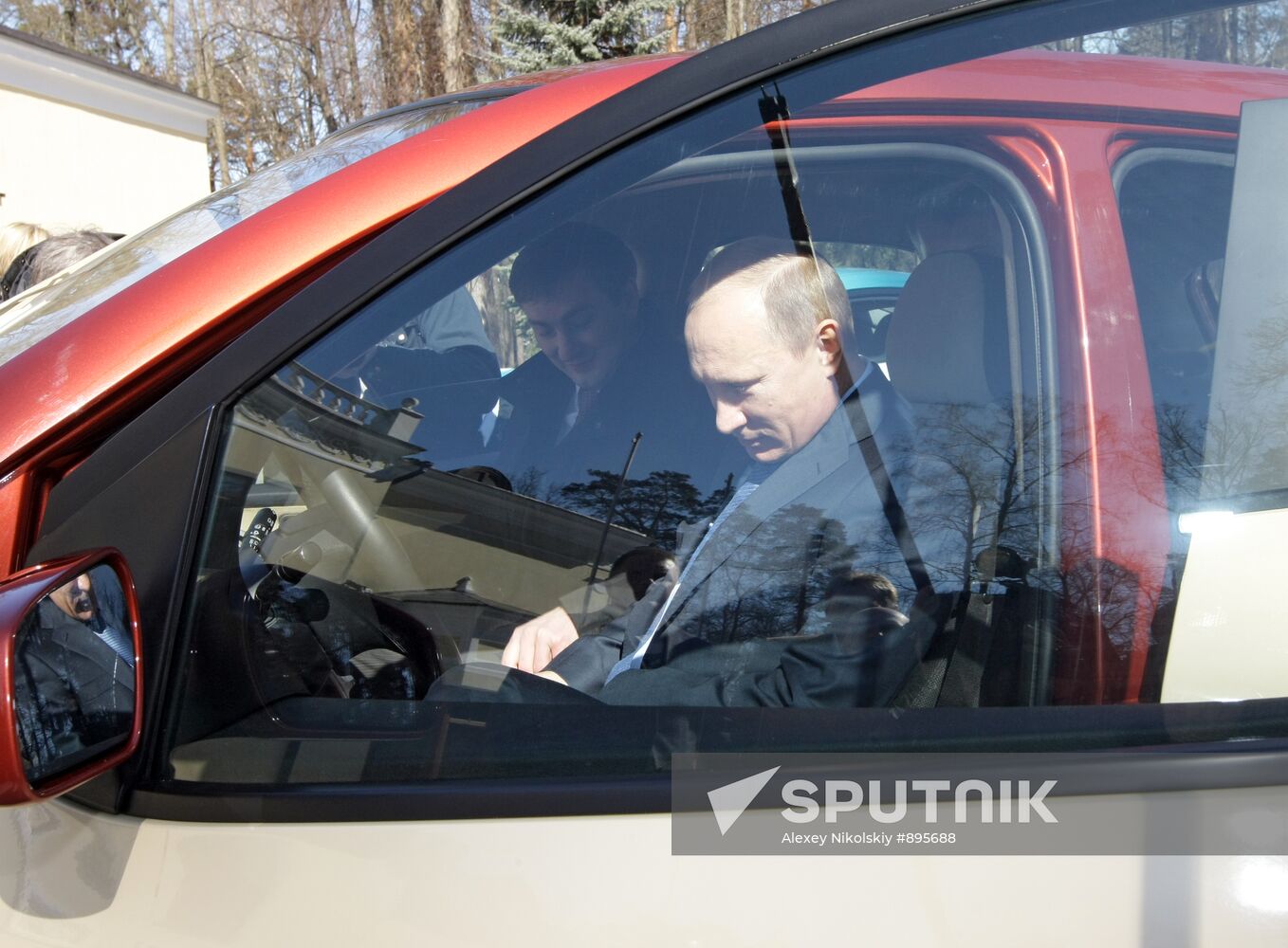 Prime Minister Vladimir Putin drives new Yo-Mobile car