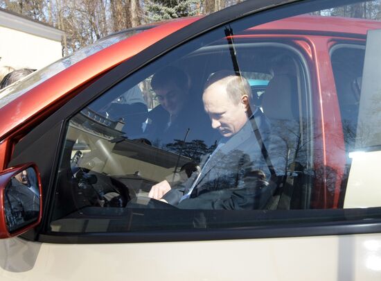 Prime Minister Vladimir Putin drives new Yo-Mobile car