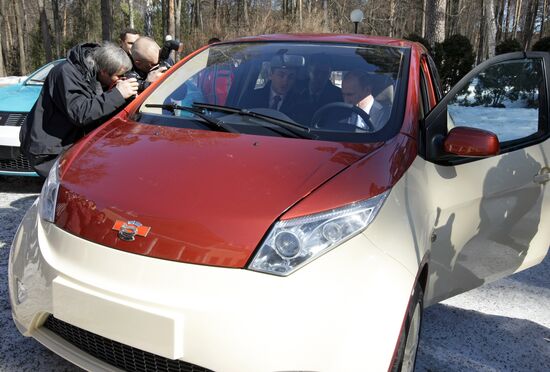 Prime Minister Vladimir Putin drives new Yo-Mobile car